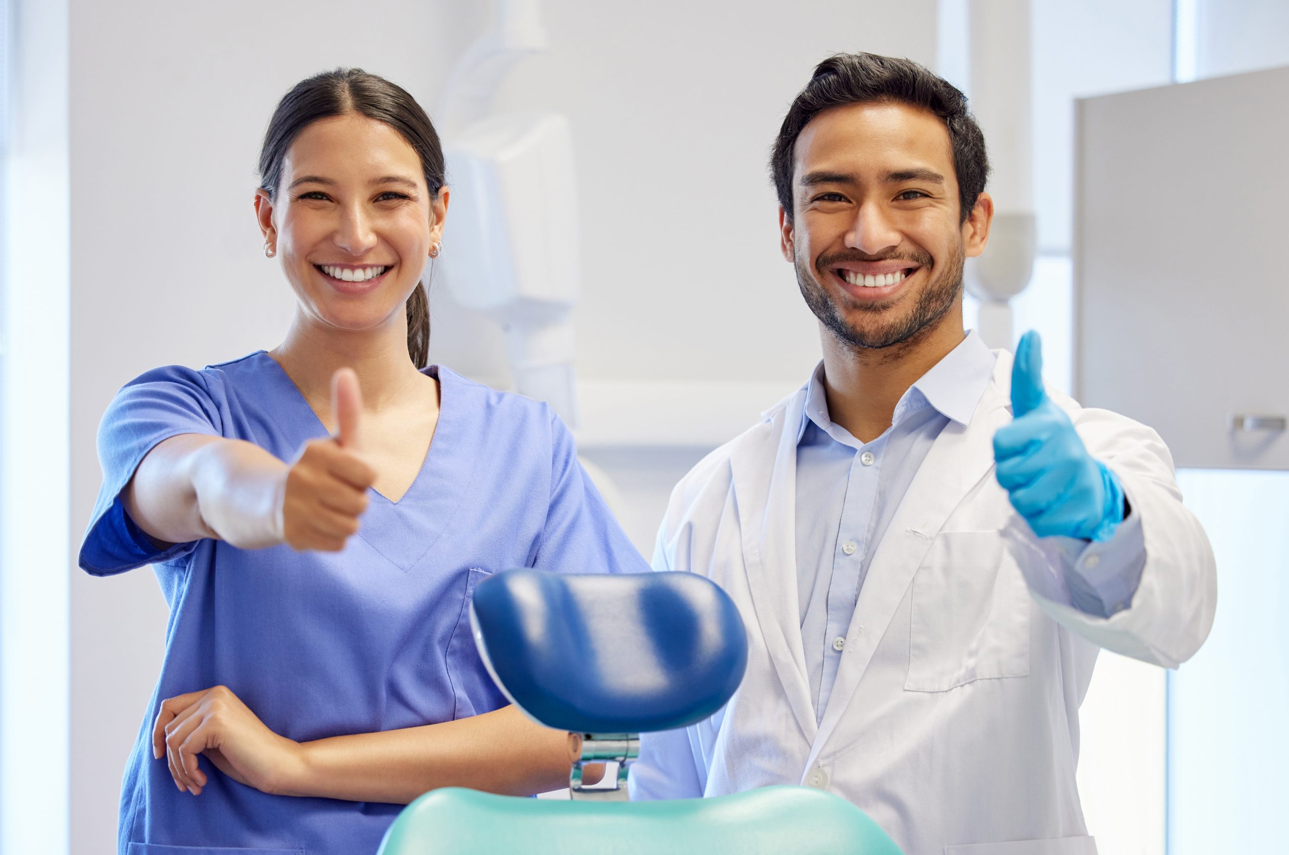 Dentist and Hygienist working together as a team